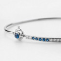 Pulsera rígida de oro, diamantes y zafiro azul
